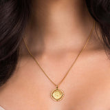 Zara Gold Mandala Pendant Necklace by ARIIRA, featuring a detailed mandala design, symbolizing harmony and balance.
