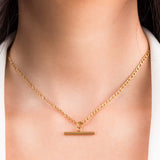 Mila Gold Bar Pendant Necklace by ARIIRA featuring a polished gold bar charm on a stylish chain.