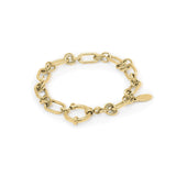 Yasna mixed link gold bracelet with statement clasp, showcasing bold contrast and layered texture.
