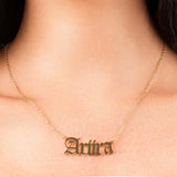Ayla Custom Name Necklace in gold with the name 'Ariira' elegantly displayed.