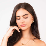 Woman wearing Nura Signature Custom Name Necklace with the name 'ARIIRA', showcasing elegant jewellery style.