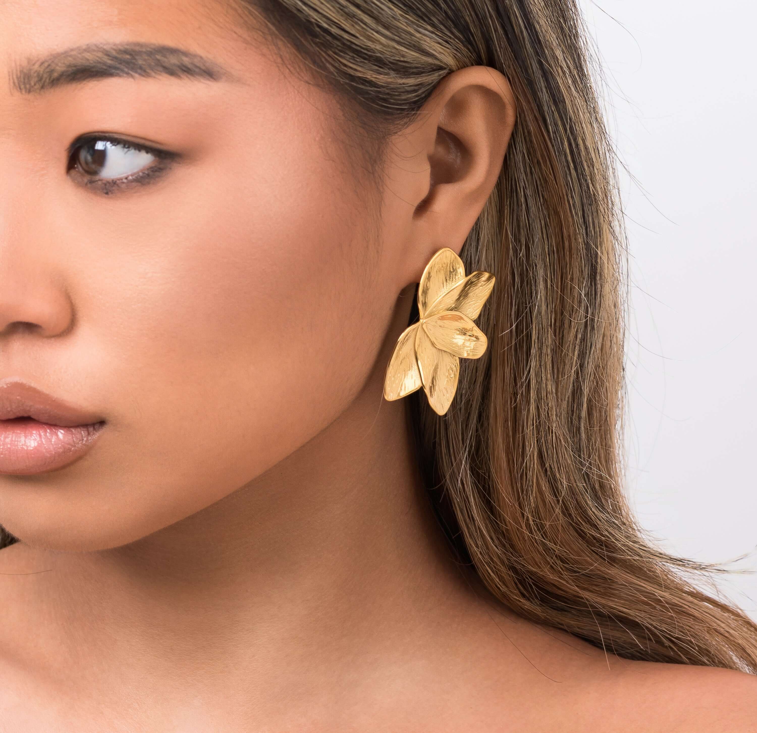 Flora Textured Bloom Stud Earrings by ARIIRA, featuring layered gold petals, capturing elegance and natural beauty.