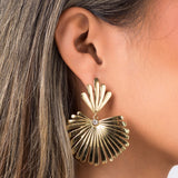 Gold fan silhouette earrings by ARIIRA with clear stone accent, embodying elegance and modern design.