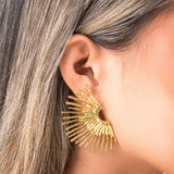 Leila Radiant Sunburst Earrings by ARIIRA, featuring bold golden lines and a sculptural design for elegant everyday wear.