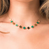 Elegant Soraya Enamel Clover Link Necklace by ARIIRA featuring gold-tone and green enamel clover links.