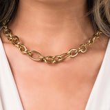 Elegant ARIIRA Sandra Oval Link Statement Chain Necklace, showcasing polished oval links for a bold and modern look.