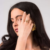 Elegant Lyra Crystal Branch Adjustable Ring by ARIIRA, showcasing delicate crystals and nature-inspired design.