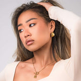 Model wearing ARIIRA Camila Toggle Chain Necklace with Padlock Pendant, showcasing a modern, elegant look.