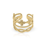 Noor Floral Crown Ring by ARIIRA featuring delicate floral details and sparkling accents in a golden finish.
