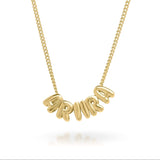 Lana Bubble Font Name Necklace in Gold with the name ARIIRA, showcasing a playful and bold design.