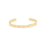 Samira Star-Set Slim Open Gold Bangle by ARIIRA with delicate star-set stones.