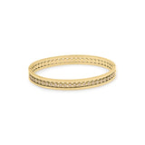 Salma Bezel Set Crystal Row Gold Bangle by ARIIRA, featuring a polished gold frame with sparkling bezel-set stones.