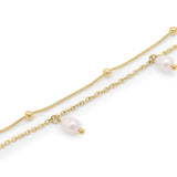 Stella Double Strand Body Chain by ARIIRA featuring gold snake and link chains adorned with freshwater pearls.