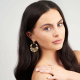 Elegant Noor Gold Textured Statement Earrings, crafted in gold-plated stainless steel, showcasing a bold sculptural design.
