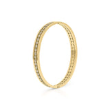Salma Bezel Set Crystal Row Gold Bangle by ARIIRA, featuring polished gold with sparkling bezel-set stones.