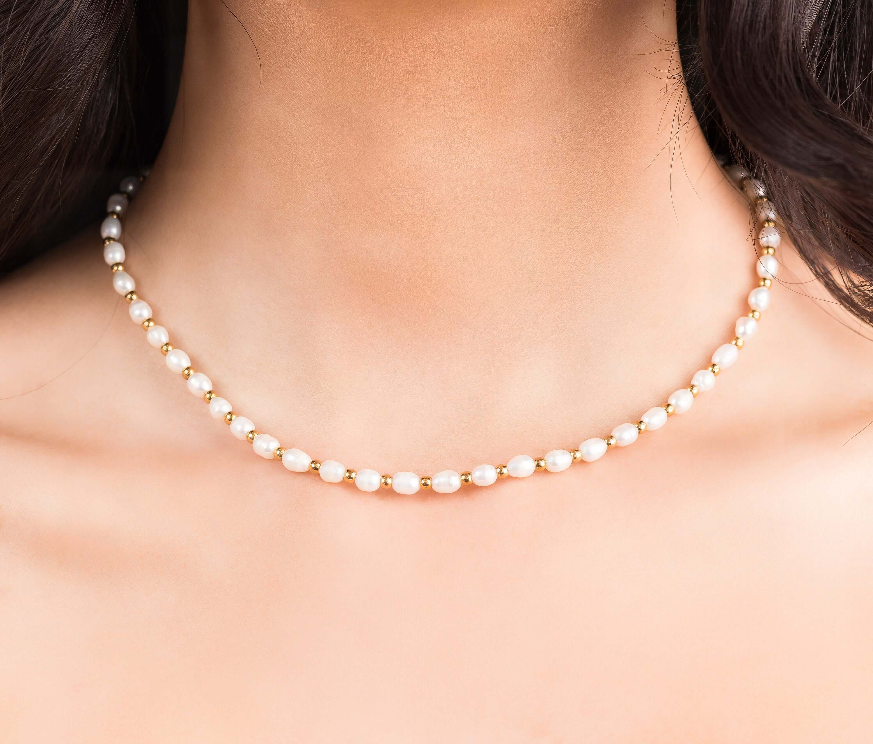 Elena Freshwater Pearl Bead Necklace by ARIIRA, featuring lustrous pearls and gold-toned beads for elegant style.