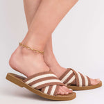 Lina Elongated Link Chain Gold Anklet paired with stylish striped sandals, adding a touch of luxury to summer outfits.