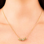 Lana Bubble Font Name Necklace in gold featuring the name ARIIRA, showcasing playful, inflated letter design.