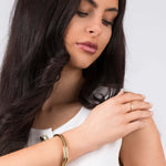 Model showcasing the Lina Crystal Bar Adjustable Ring for a refined jewelry look.