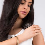 Model showcasing the Lina Crystal Bar Adjustable Ring for a refined jewelry look.