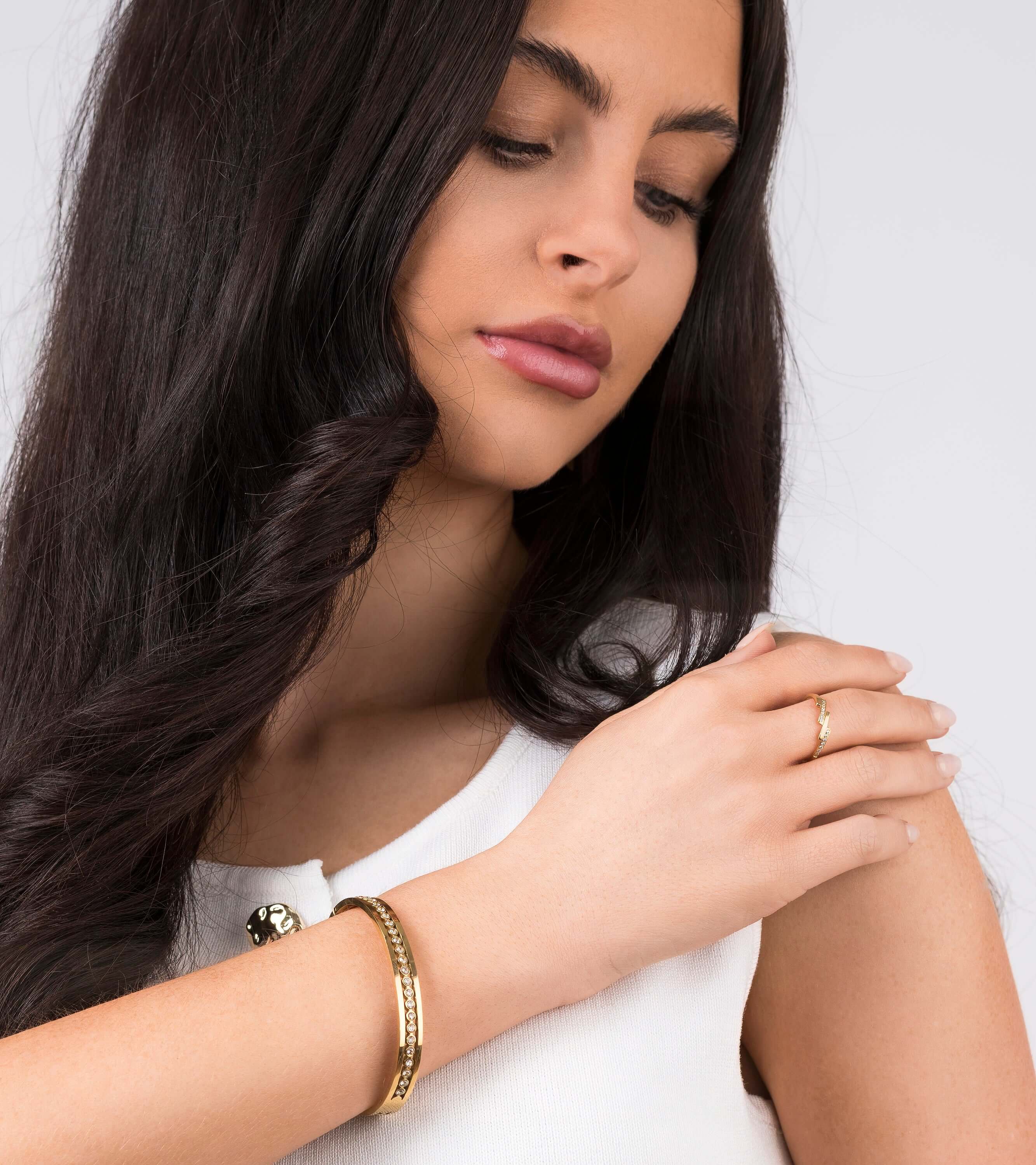 Model showcasing the Lina Crystal Bar Adjustable Ring for a refined jewelry look.