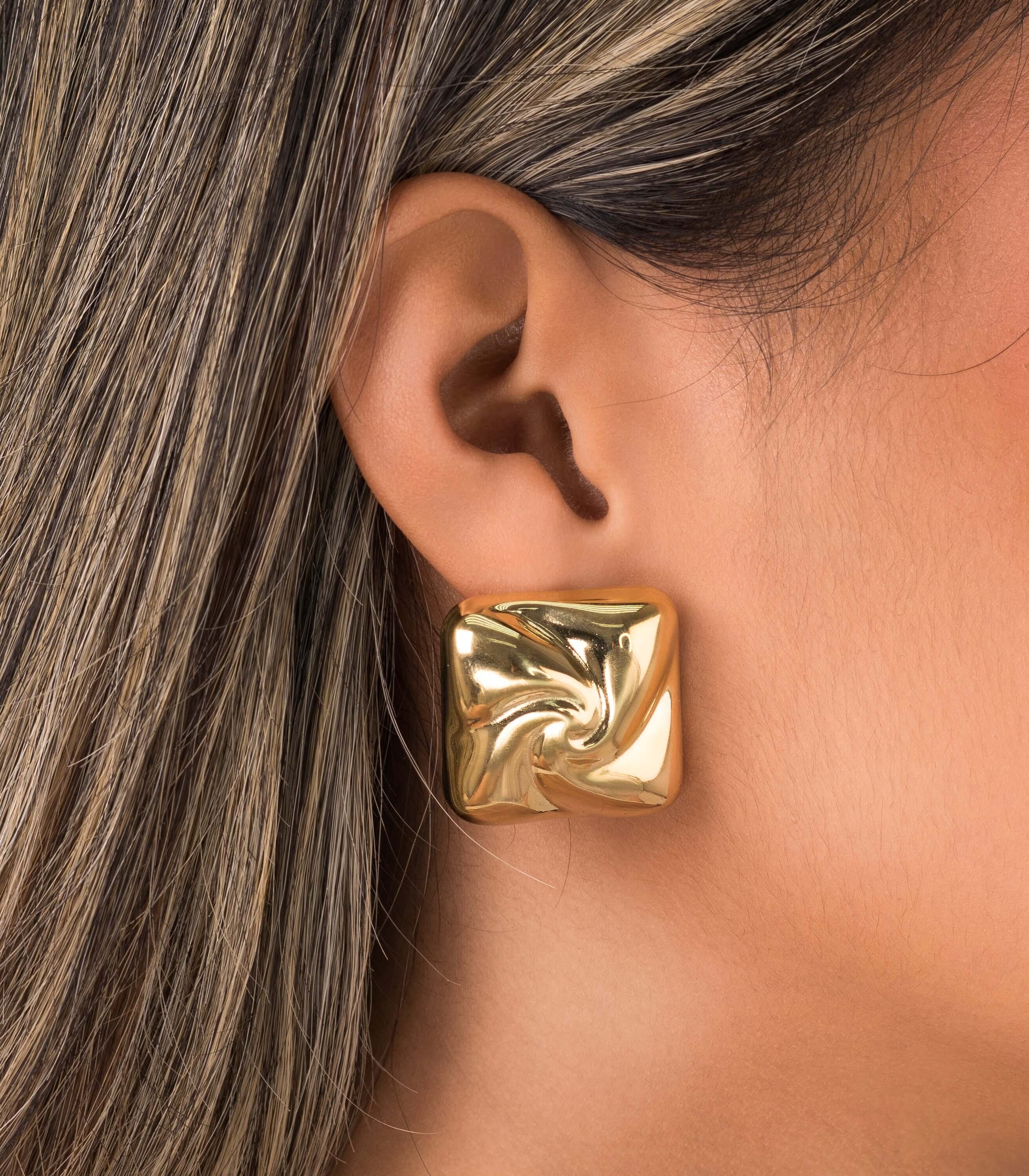 Mira Sculpted Stud Earrings by ARIIRA, showcasing a sculptural square design with polished gold finish.