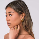 Mira sculpted stud earrings by ARIIRA, featuring gentle swirls and a lightweight, tarnish-free design, perfect for any style.