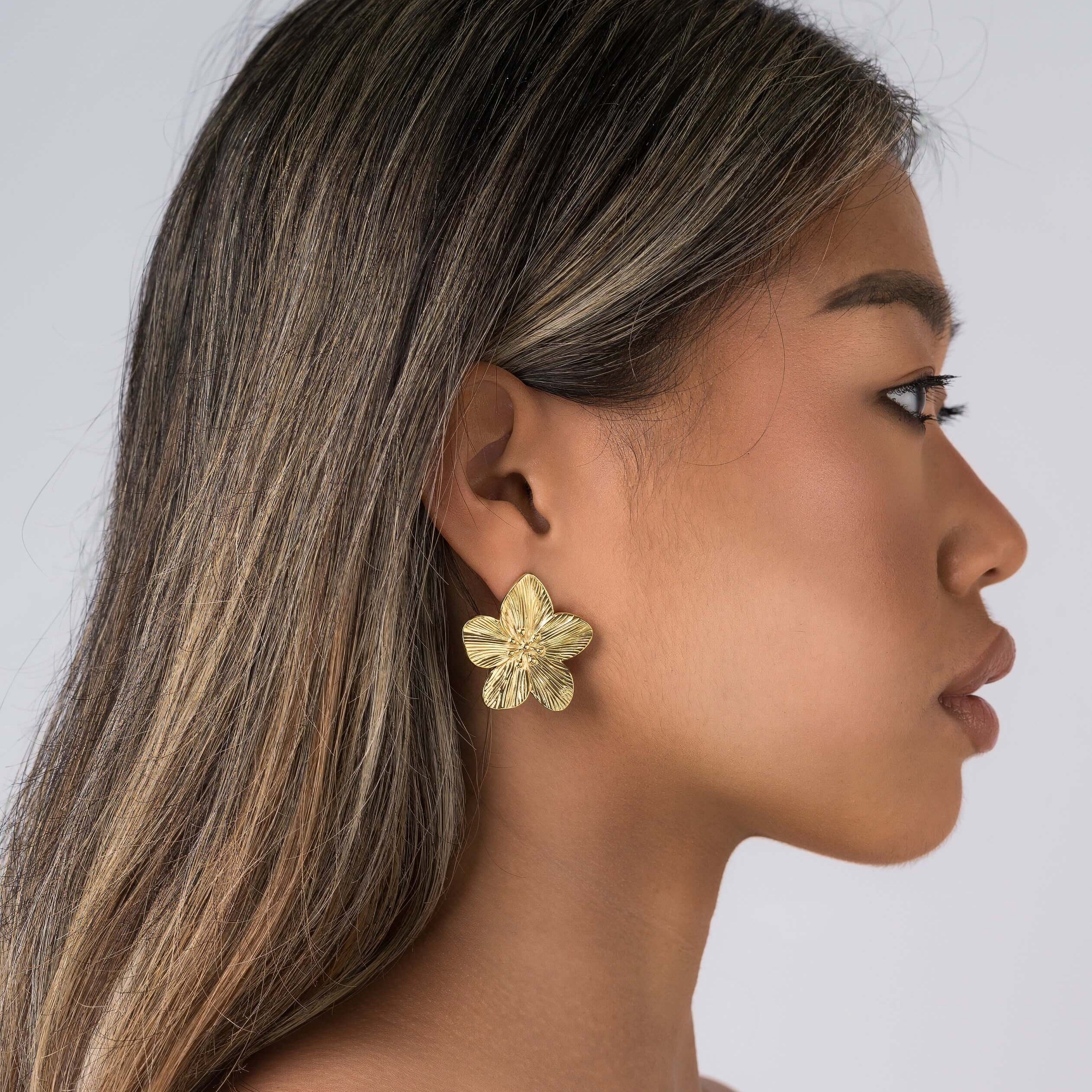 Elegant ARIIRA Isla Blooming Petal Earrings in gold, showcasing intricate texture and design, perfect for modern and romantic styles.