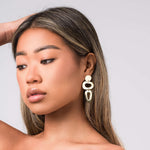 Iris Sculptural Drop Earrings by ARIIRA, featuring soft curves and bold design, perfect for self-expression and modern elegance.
