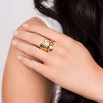 Hand wearing ARIIRA's Nadia Hammered Sculptural Open Ring, showcasing its unique design and hammered finish.