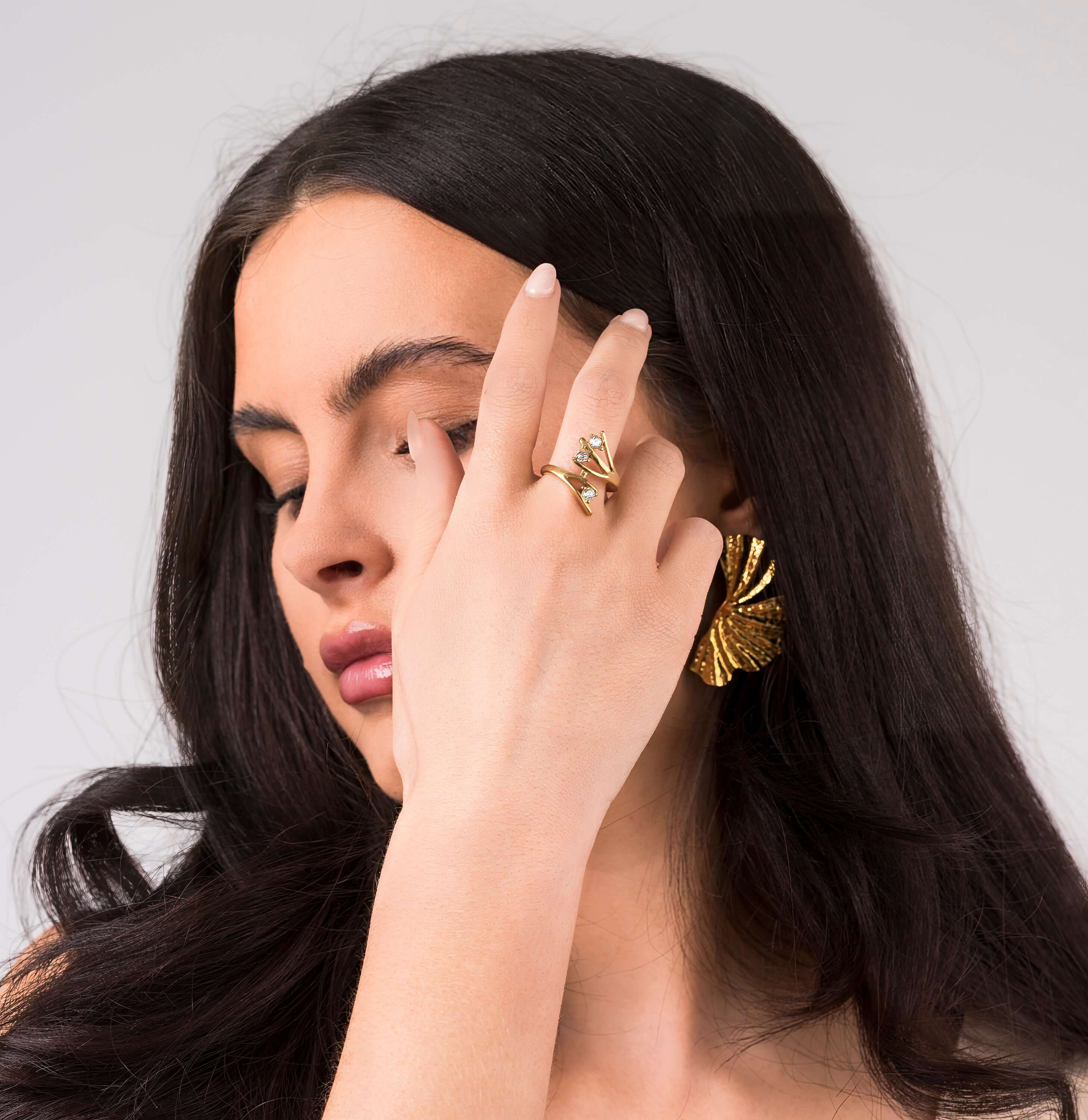 Elegant Lyra Crystal Branch Adjustable Ring by ARIIRA, showcasing delicate crystals and nature-inspired design.