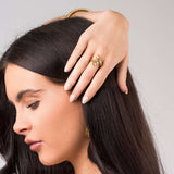 Woman wearing the ARIIRA Lyra Crystal Branch Adjustable Ring, showcasing its nature-inspired elegance.