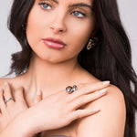 Model showcasing the Inaya Sculptural Open Dome Ring by ARIIRA with elegant styling and polished finish.