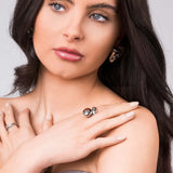 Model showcasing the Inaya Sculptural Open Dome Ring by ARIIRA with elegant styling and polished finish.