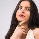 Model showcasing the Inaya Sculptural Open Dome Ring with soft curves and a polished mirror finish.