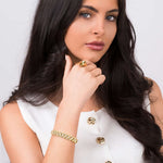 Model showcasing the ARIIRA Raisa Sculpted Link Bracelet with crystal insets and a fashionable ring.