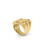 Alina Gold Sculpted Statement Ring by ARIIRA, featuring smooth wave-like ridges in gold-plated stainless steel.