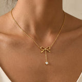 Gold Choprah Bowknot Tassel Necklace