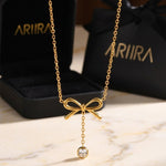 Gold Choprah Bowknot Tassel Necklace
