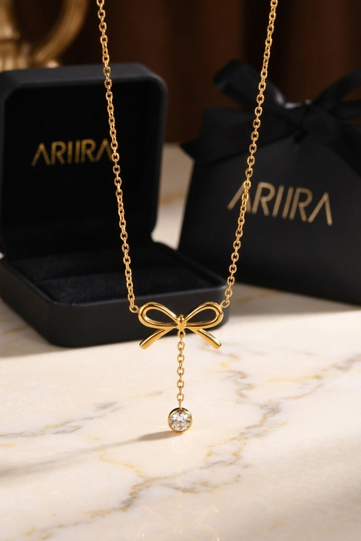 Gold Choprah Bowknot Tassel Necklace