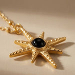 gold Gaia Gold Tone Starburst Pendant Necklace