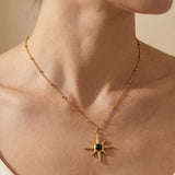 gold Gaia Gold Tone Starburst Pendant Necklace