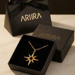 gold Gaia Gold Tone Starburst Pendant Necklace