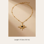 gold Gaia Gold Tone Starburst Pendant Necklace