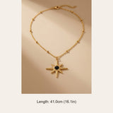 gold Gaia Gold Tone Starburst Pendant Necklace