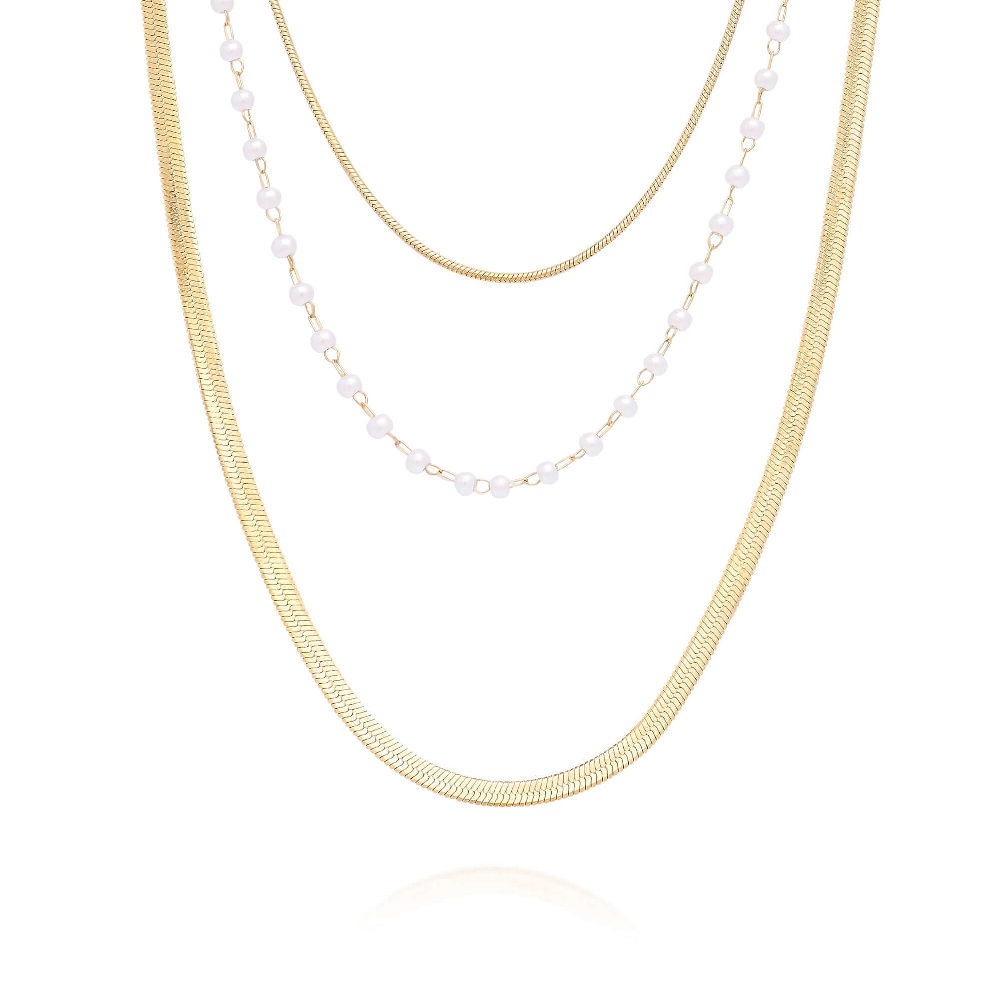 Noor Layered Pearl and Gold Necklace by ARIIRA featuring gold chains and delicate pearl accents.