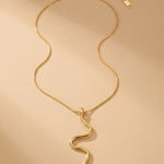 gold India Gold Tone Wavy Serpent Pendant