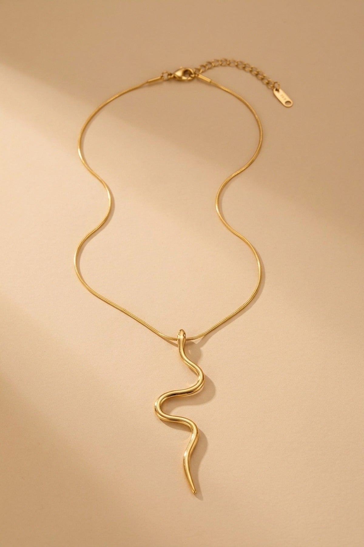 gold India Gold Tone Wavy Serpent Pendant