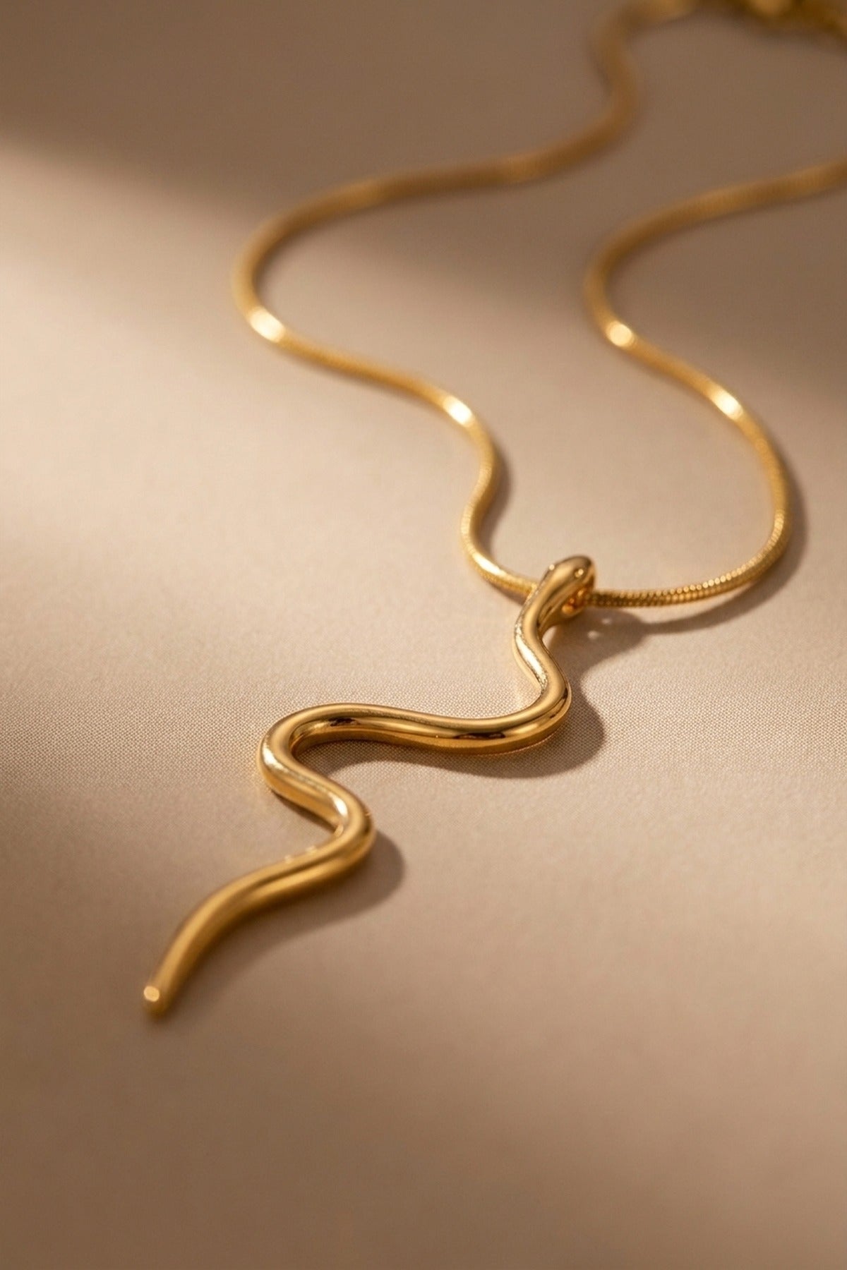 gold India Gold Tone Wavy Serpent Pendant