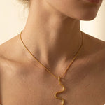 gold India Gold Tone Wavy Serpent Pendant